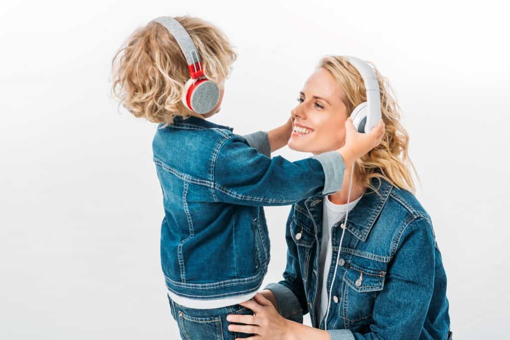 mother and child listening to tomatis in headphones for emotional wellness